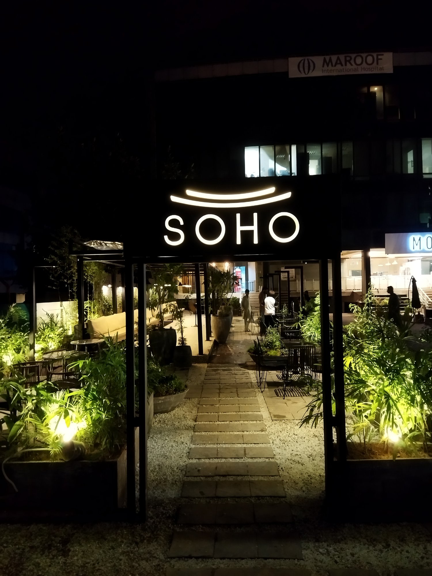 SOHO neon sign at night